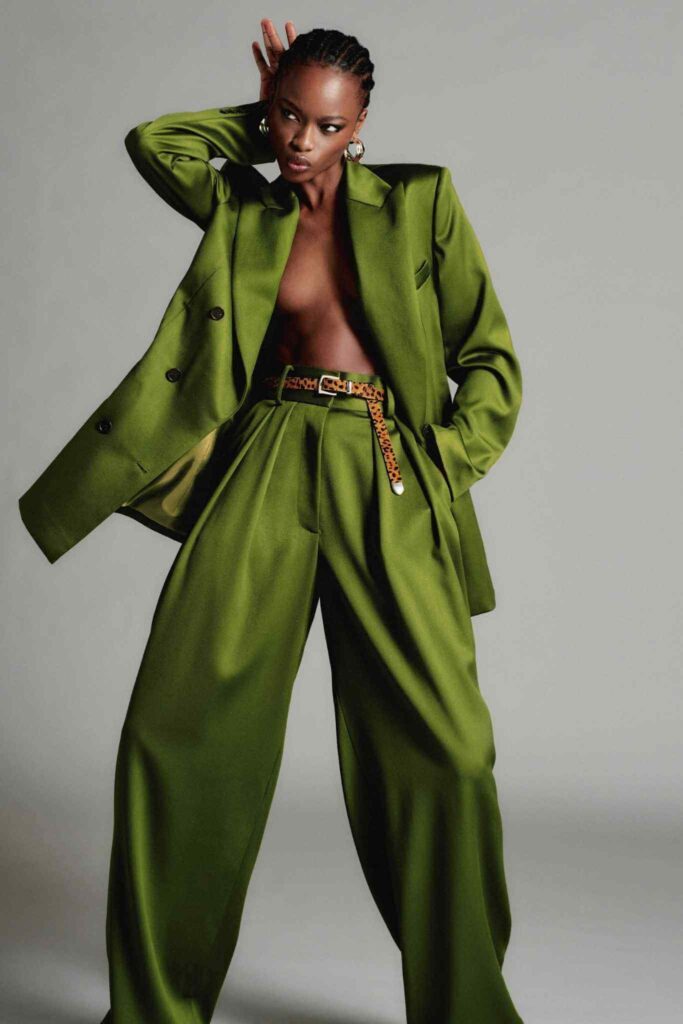 Lady in green wide legged Brandon Maxwell trouser suit